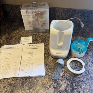 The First Years White Baby Bottle Warmer with Blue Steaming Lid
